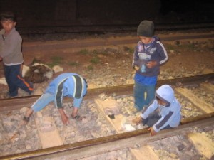 I'm pretty sure I was never allowed to play in (active) train tracks as a kid...