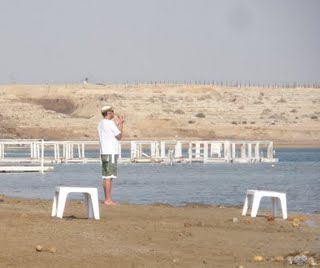 A guy wails his prayers on the beach and we are extremely irritated by it
