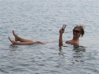 Reading my book in the Dead Sea