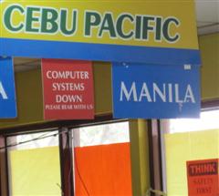 Signs at airports saying "Computers down, please bear with us" do not instill confidence