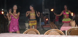 The Whispering Tranny and his friends "dazzle" us with some dancing and fire breathing